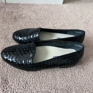 Black woven leather loafers